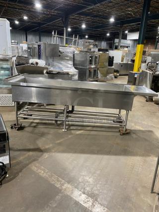 Commercial stainless steel single-well extra-large ice bin with right side drain board, on legs. Ideal for cocktail stations.