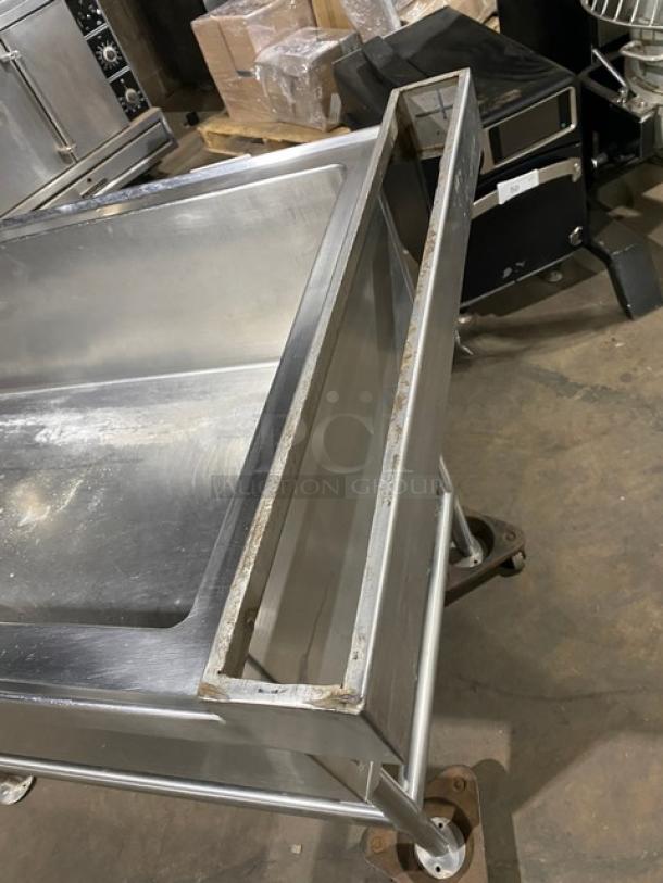 Commercial stainless steel single-well extra-large ice bin with right side drain board on legs; used condition.