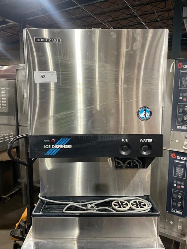 Hoshizaki DCM-500BAF stainless steel ice/water dispenser in good condition, with drip tray, 115-120V, 1 phase.