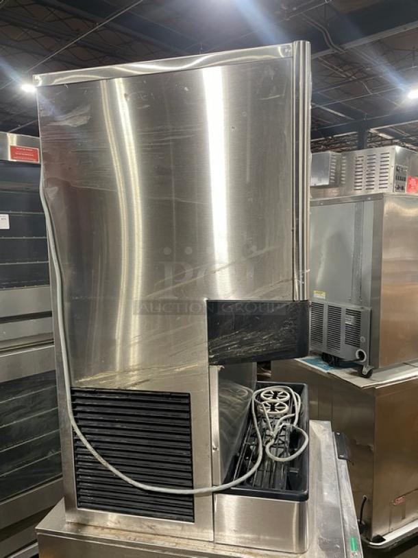Hoshizaki stainless steel ice/water dispensing machine, model DCM-500BAF, with drip tray. Electric, 115-120V, 1 phase.