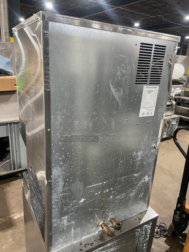 Hoshizaki DCM-500BAF stainless steel ice/water dispenser with drip tray, 115-120V, electric-powered, commercial-grade, used condition.
