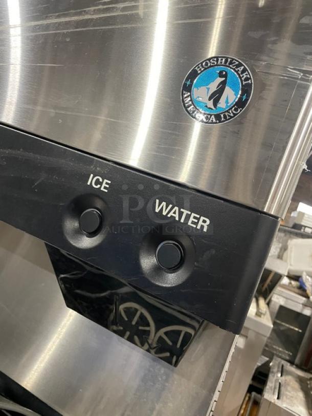 Hoshizaki DCM-500BAF stainless steel ice/water dispenser with drip tray, electric-powered, 115-120V, 1 phase, good condition.