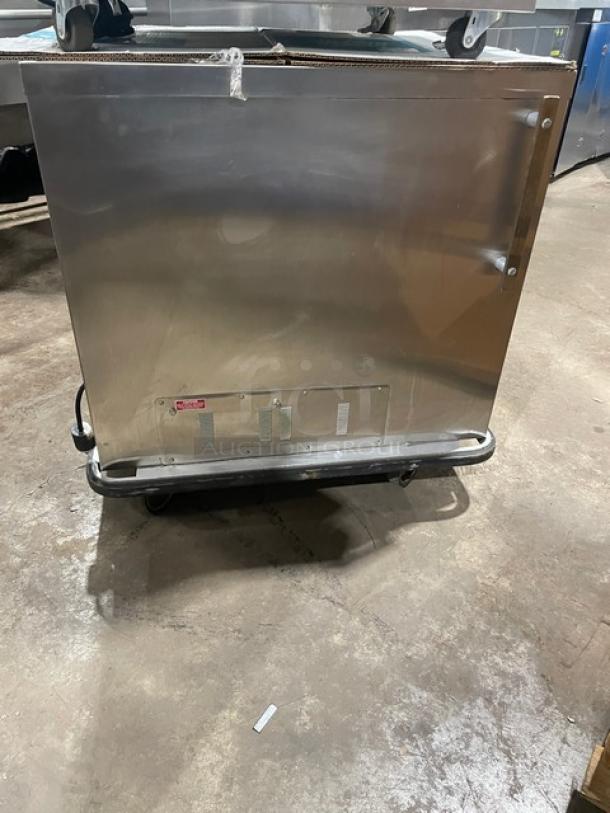 FWE UHS-4 stainless steel heated cabinet, electric, 4-pan capacity, model UHS4, serial 9428763, on casters, 120V.