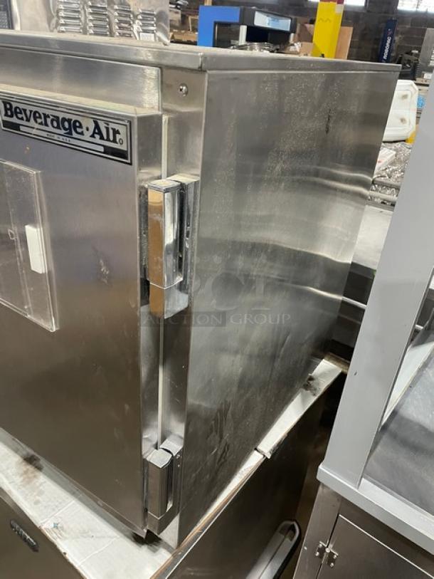 Beverage-Air UCR27A stainless steel single door undercounter refrigerator on casters, featuring a poly coated wired rack, 115V, 1 phase.