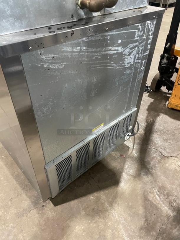 Beverage-Air UCR27A-24-23 stainless steel undercounter refrigerator, electric, single door with poly-coated rack, visible wear.