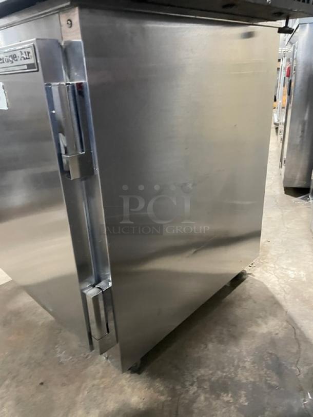 Beverage-Air UCR27A stainless steel undercounter refrigerator on casters, single door, with poly coated wire rack.