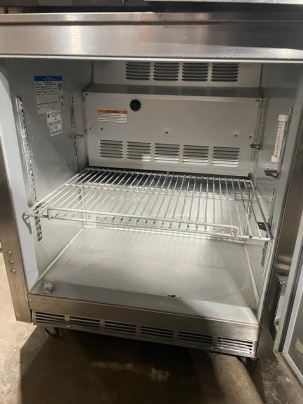 Beverage-Air UCR27A stainless steel undercounter refrigerator with poly-coated wire rack, model UCR27A, on casters.
