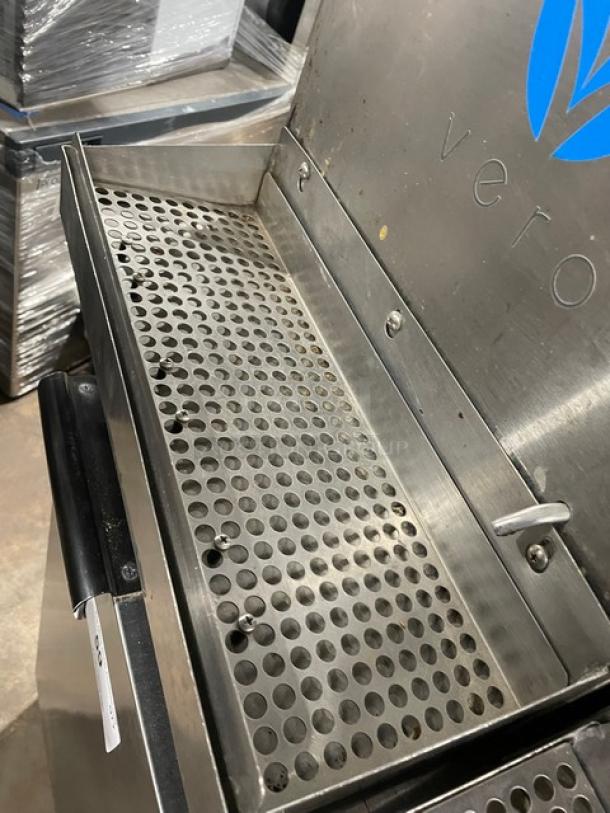 Vero stainless steel electric countertop water dispenser with drip tray, commercial-grade, embossed logo, gently used.