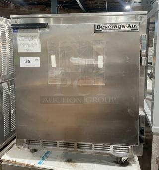 Beverage-Air UCR27A stainless steel undercounter refrigerator, single door, poly coated rack, on casters, model tag visible.