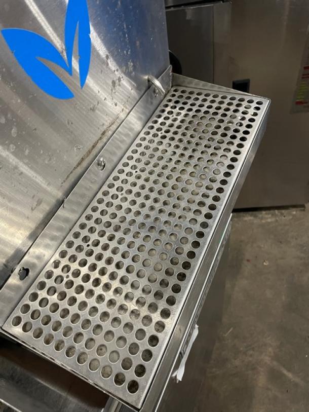 Vero stainless steel countertop water dispenser with drip tray, commercial-grade, electric-powered, used condition.