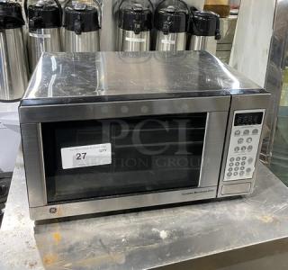 GE JES1142SJ06 stainless steel countertop microwave, electric powered, commercial model, SN: HT917648U, model from 2010.