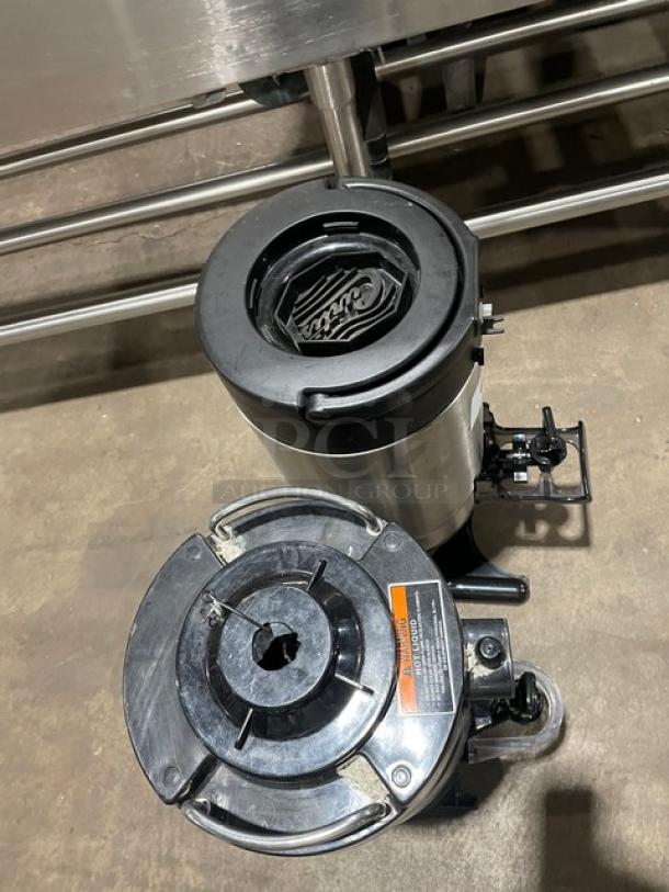 Bunn/Curtis stainless steel insulated coffee server in good condition, featuring secure lid and dispensing tap.