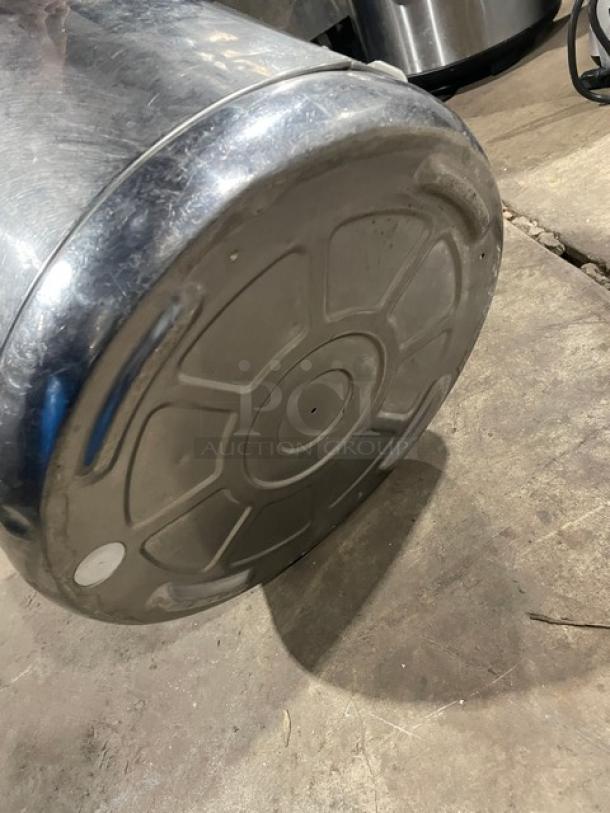 Zojirushi stainless steel sushi rice container with lid, commercial grade. Slight wear visible on surface.