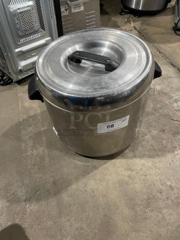 Zojirushi commercial stainless steel sushi rice container with lid. Features side handles and visible tag. Good condition.