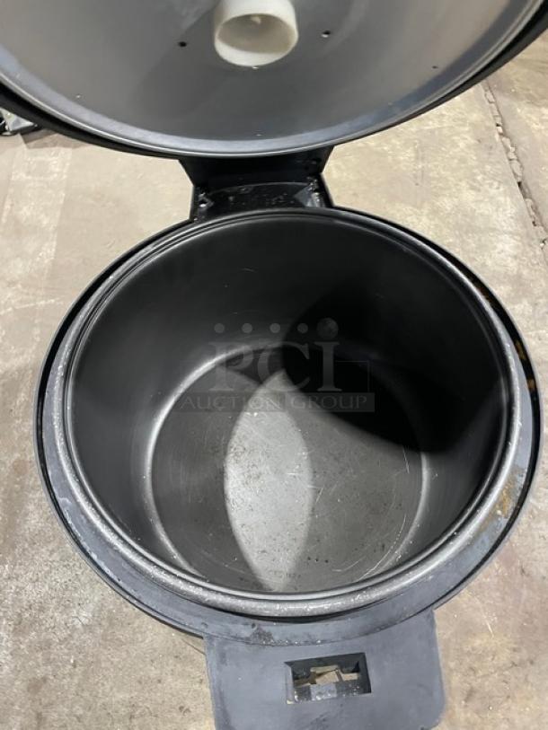 Aroma ARC-1130S commercial stainless steel electric rice cooker, open lid view, showing spacious interior, used condition.