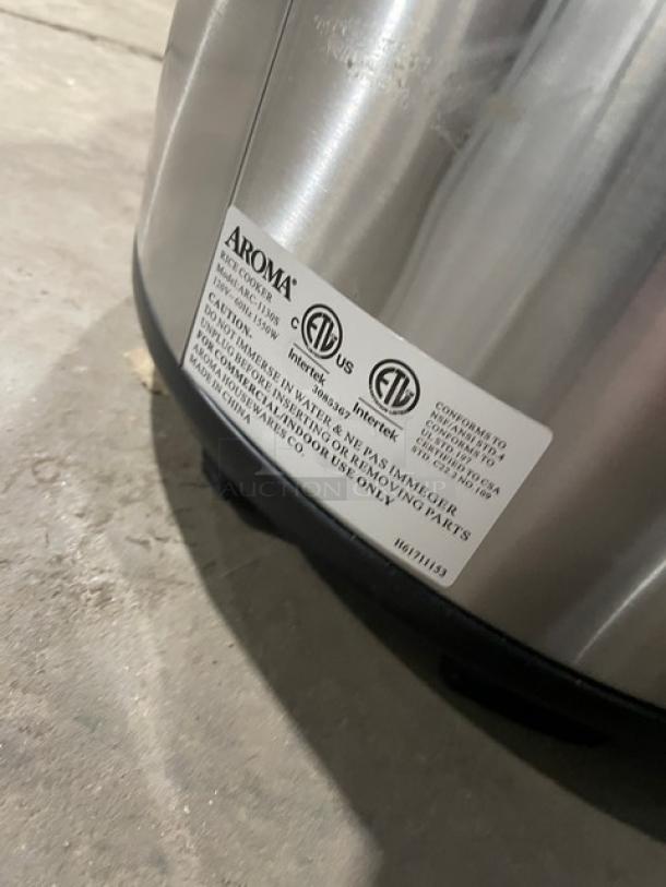 Aroma ARC-1130S stainless steel rice cooker, commercial model. Features: electric, 120V, countertop use. Label shows certifications.