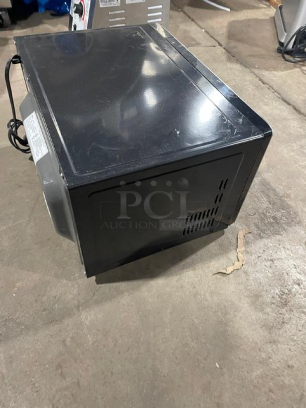 LG LCS1112ST stainless steel commercial microwave oven with one-touch digital control. Good condition, 120V.