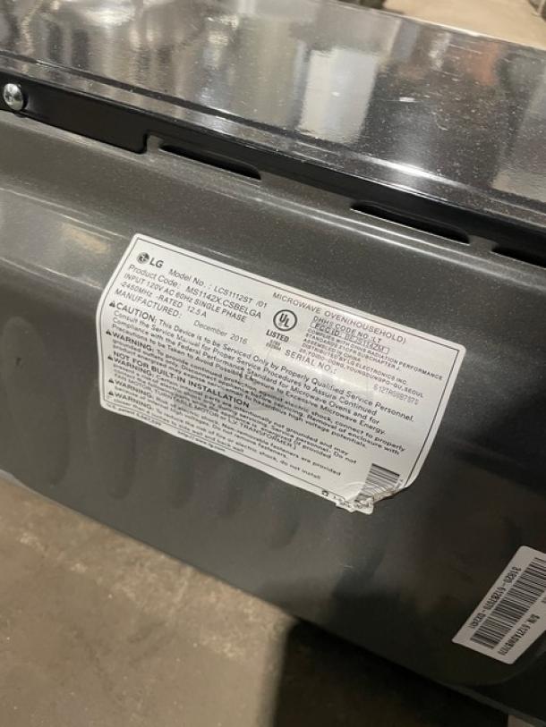 LG Stainless Steel Countertop Microwave Oven, Model LCS1112ST, with one-touch digital control. Serial Number: 512TASWB7070.