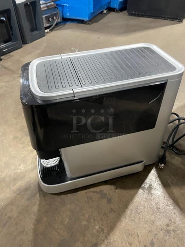 Mars 2025 commercial black electric countertop automatic coffee machine with drip tray, excellent condition.