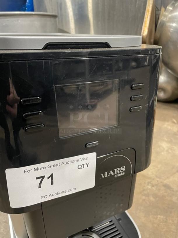 Mars 2025 black electric countertop automatic coffee machine with drip tray, visible label "Mars drinks," auction tag "71."
