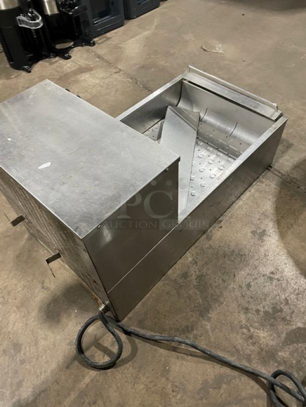 Carter Hoffmann CNH18 countertop fry warming station in stainless steel, with backsplash. Model CNH18, 120V, 1 phase.