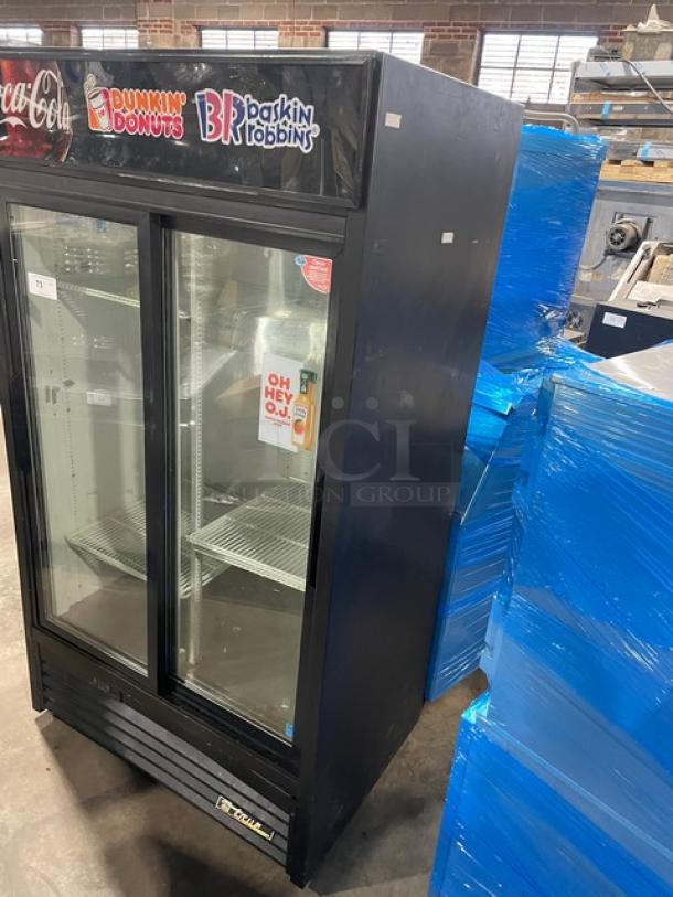 True Dunkin Donuts/Baskin Robbins commercial refrigerator, model GDM-37EM. Black, double glass sliding doors, poly-coated racks.