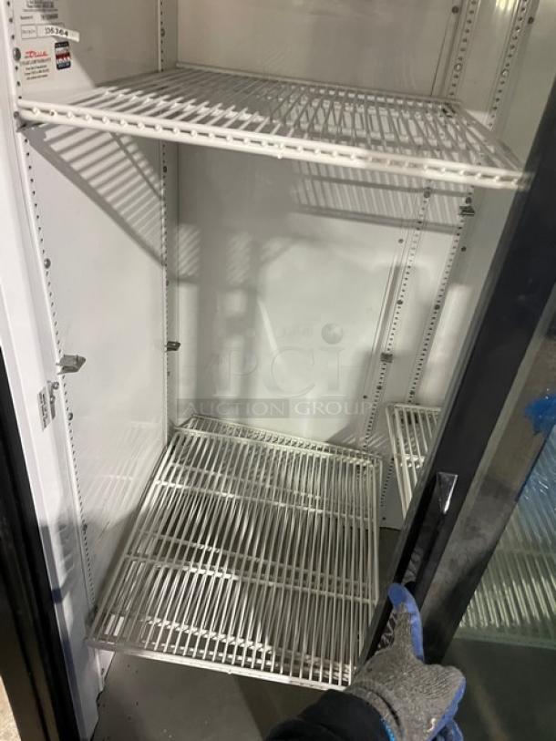 True GDM-37EM black double glass sliding door refrigerator; Energy Star Certified, poly coated wire racks, commercial use.