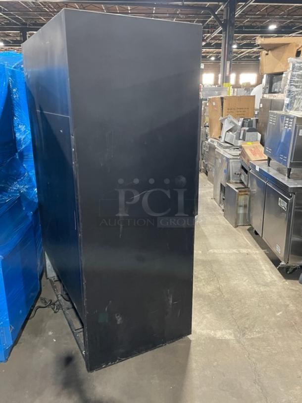 True Commercial Black Double Glass Sliding Door Merchandiser Refrigerator, Model GDM45, poly-coated wired rack.