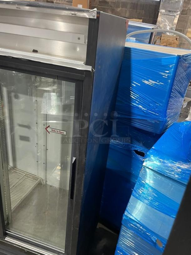 True Commercial Black Double Glass Sliding Door Merchandiser Refrigerator, Model GDM-45, with poly-coated wire rack.