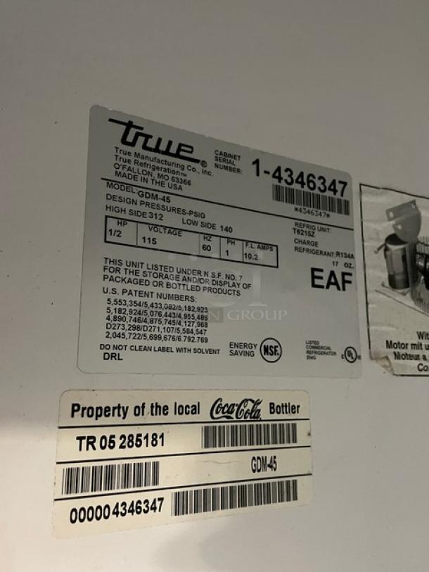 True GDM-45 refrigerator label showing model, serial number 1-4346347, 115V specs, and Coca-Cola property tag.