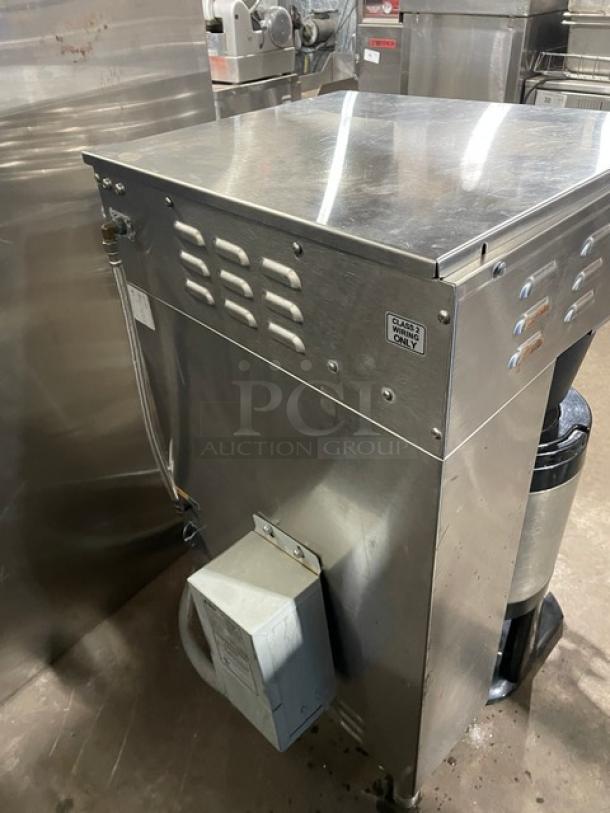 Curtis TP2T16A3100 stainless steel twin coffee brewer, 220V 3-phase, includes hot water dispenser, insulated servers, on legs.