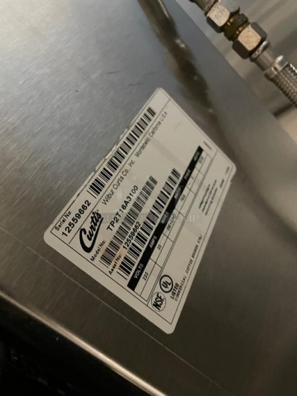 Curtis ThermoPro TP2T16A3100 commercial stainless steel twin coffee brewer, 220V, SN: 12559662, with hot water dispenser.
