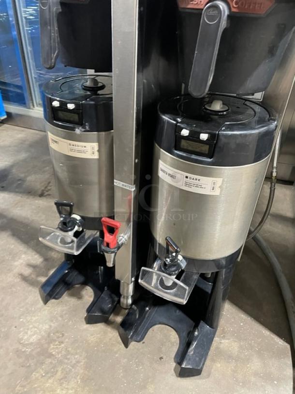 Curtis ThermoPro TP2T16A3100 twin coffee brewer with hot water dispenser, stainless steel, insulated servers, 220V, on legs.