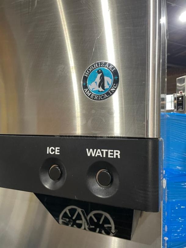 Hoshizaki stainless steel ice and water dispenser, model DCM-500BWF. Features ice and water buttons, drip tray included.