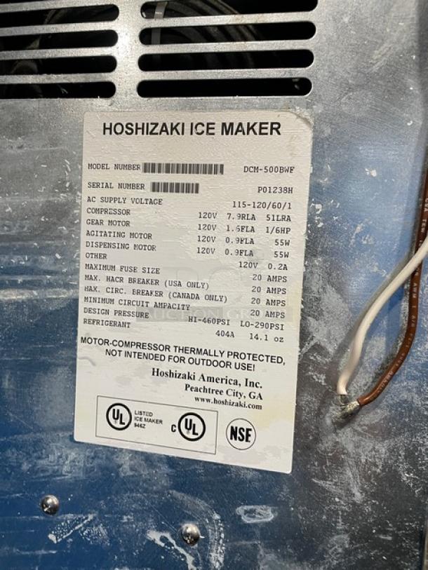 Hoshizaki DCM-500BWF commercial ice maker label, detailing model, serial number P01238H, 115-120V, water-cooled unit.