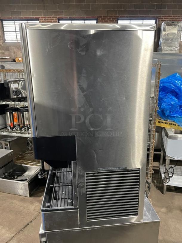Hoshizaki DCM-500BAF stainless steel ice maker and water dispenser, electric, countertop, with drip tray, air-cooled, good condition.