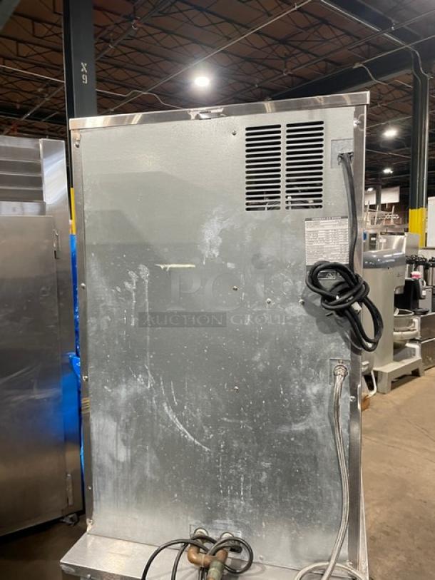 Hoshizaki DCM-500BAF ice maker and water dispenser, stainless steel, electric, countertop model, with drip tray, used condition.