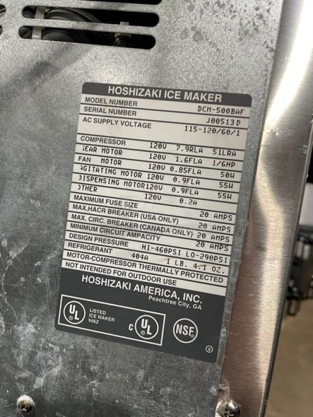 Hoshizaki DCM-500BAF stainless steel ice maker with drip tray, serial J00513D, 115-120V, UL and NSF certified.