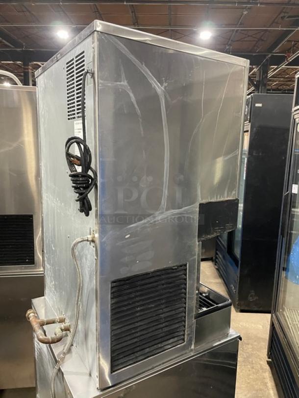 Hoshizaki DCM-500BAF stainless steel ice maker/water dispenser, electric-powered, air-cooled, with drip tray; used condition.