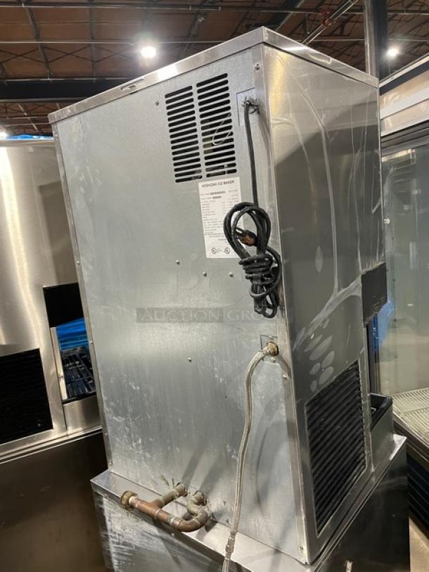 Hoshizaki DCM-500BAF stainless steel ice maker/water dispenser, electric air-cooled, with drip tray, used condition.