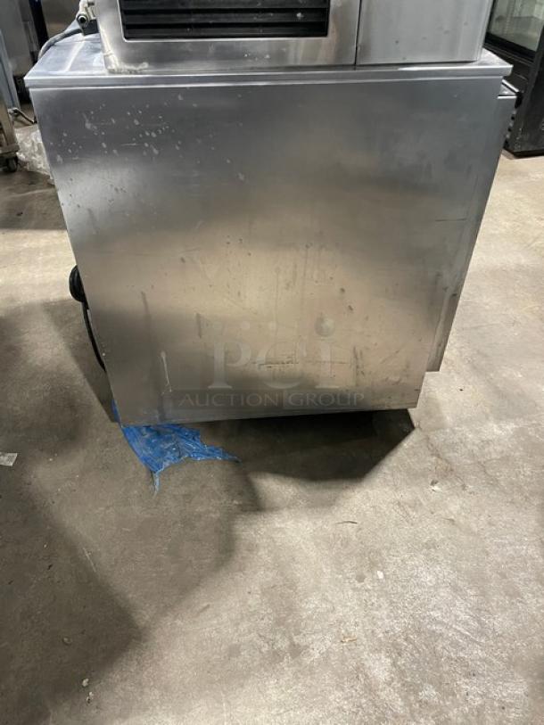 Beverage-Air UCR27A stainless steel undercounter refrigerator with poly coated wire rack, single door, on casters.