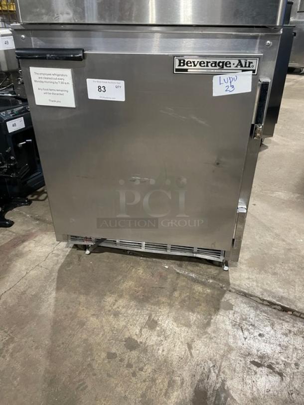 Beverage-Air UCR27Y stainless steel undercounter refrigerator, single door, poly-coated rack, on casters, model tag visible.