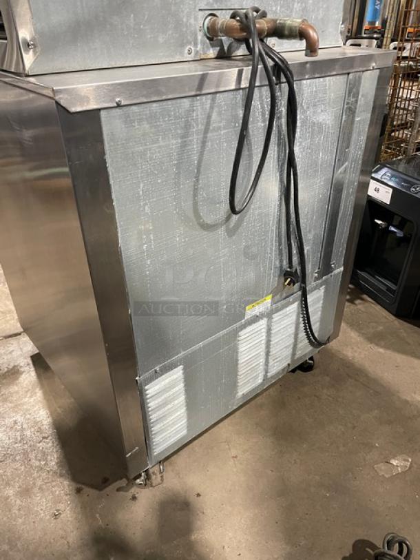 Beverage-Air UCR27Y stainless steel undercounter refrigerator on casters, with poly coated wired rack, 115V, single door.