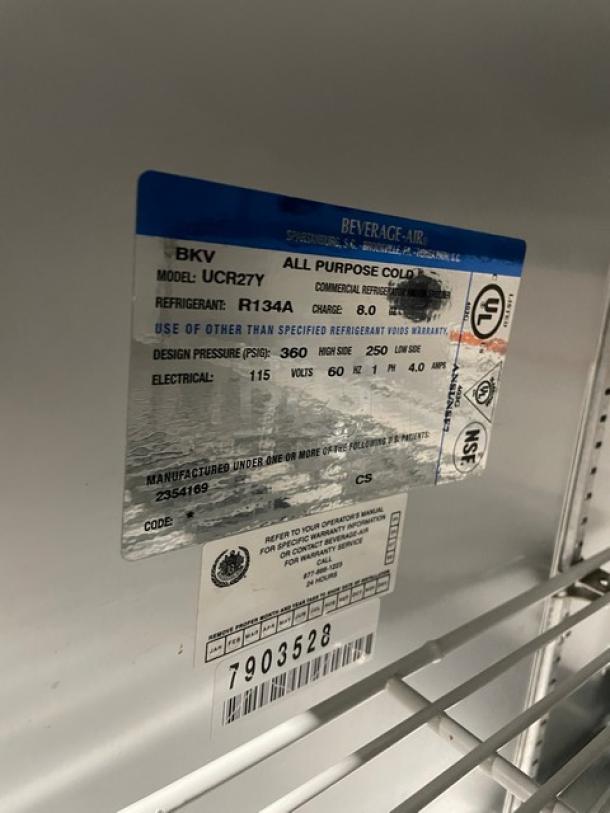 Beverage-Air UCR27Y commercial stainless steel refrigerator label, indicating model, refrigerant type, and serial number 7903528.