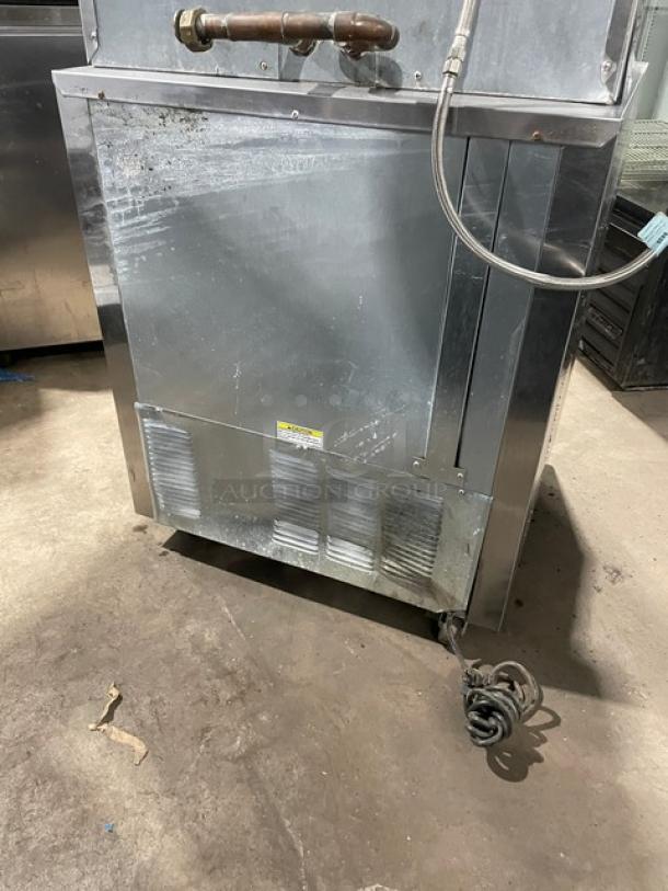 Beverage-Air UCR27 stainless steel undercounter refrigerator, 115V 1 Phase, with poly-coated rack, on casters, serial SN: 8209666.