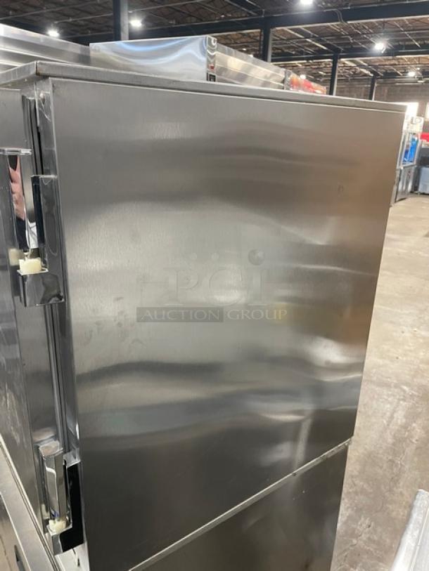 Beverage-Air UCR27Y stainless steel undercounter refrigerator, shallow-depth, single door, poly coated rack, on casters.