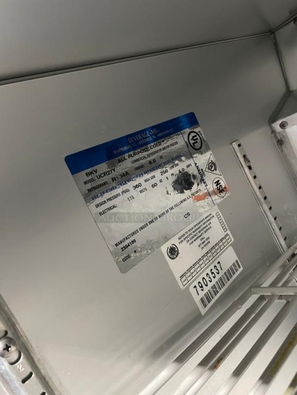 Beverage-Air UCR27Y stainless steel undercounter refrigerator, single door, shallow-depth, with poly-coated wire rack, SN: 7903537, 115V, on casters.