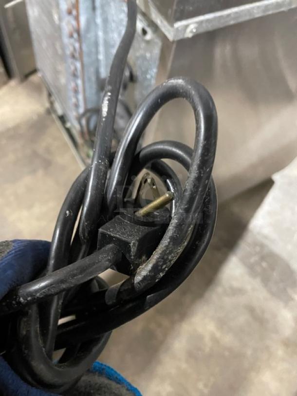 Beverage-Air UCR27Y stainless steel undercounter fridge. Includes poly-coated rack, 115V, single-phase, on casters.