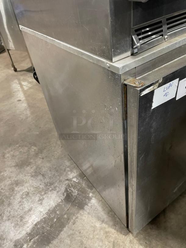 Delfield 406CA-DHL-DD1 stainless steel single door undercounter refrigerator on casters. Poly coated rack included.