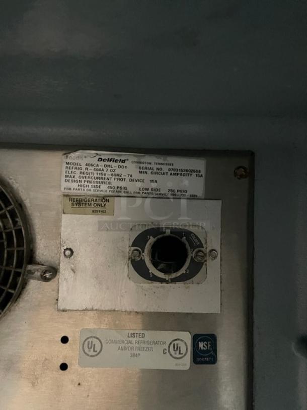 Delfield 406CA-DHL-DD1 refrigerator label showing model, serial number, and electrical specifications.